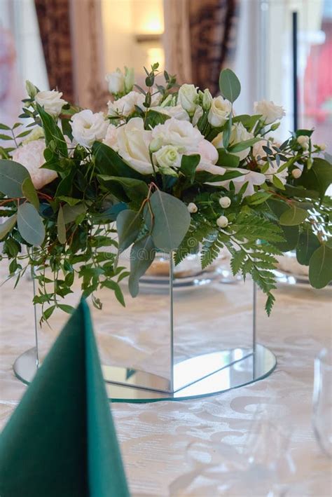 Beautiful Floral Arrangement Of Rose Flowers And Greenery On Wedding