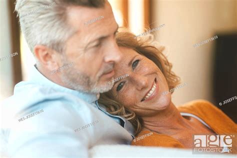 Happy Mature Woman With Man At Home Stock Photo Picture And Royalty