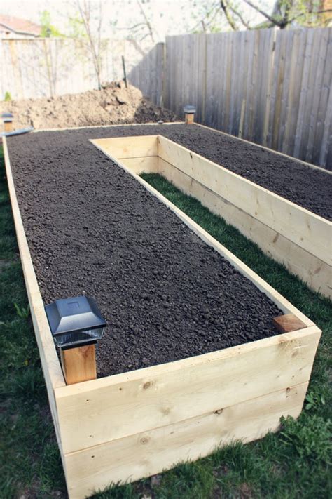 These diy raised garden beds with garden safe pallets can be completed in a few short hours. DIY Easy Access Raised Garden Bed - The Owner-Builder Network