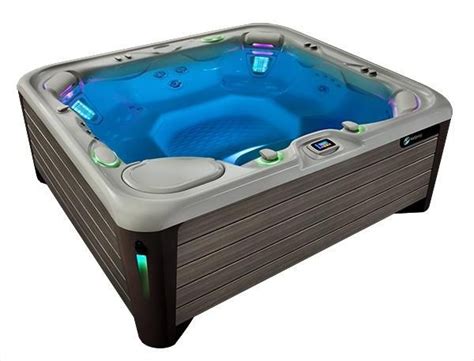 How Much Does A Hot Tub Cost Hot Spring Spas Hot Tub Reviews Luxury Hot Tubs Tub