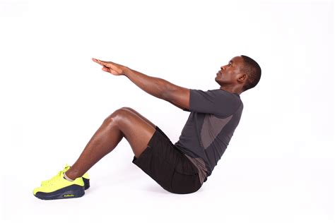 Athletic Man Doing Sit Ups Exercise With Legs Bent