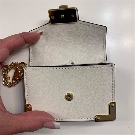 Designer handbags, watches, shoes, clothing & more. Michael Kors Optic White Kinsley Accordion Credit Card ...