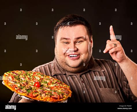 Eating Contest Pizza Fat Man Eating Fast Food For Overweight Person Stock Photo Alamy