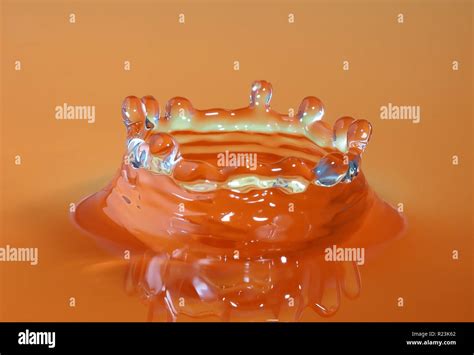 Red Water Splash In Shape Of Crown Stock Photo Alamy