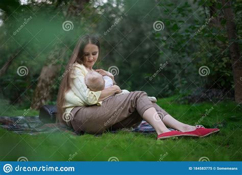Mother Breastfeeds Baby Mother Breastfeeding Her Newborn Baby Beside