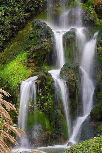 A Beautiful Nature Scene Of A Cascading Water Fall That