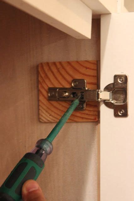 Install cabinet door latches according to the manufacturer's regulations. DIY Built-Ins Series: How to Install Inset Cabinet Doors ...