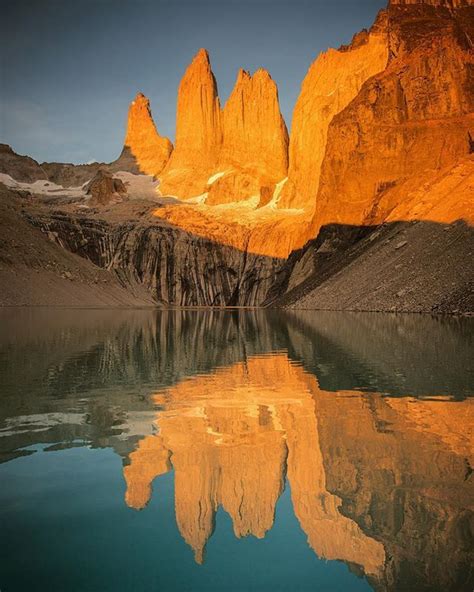 The Iconic Torres Of Torres Del Paine National Park Lit Up With The