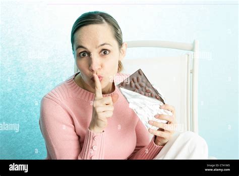 Woman And Secret Snacking Hi Res Stock Photography And Images Alamy
