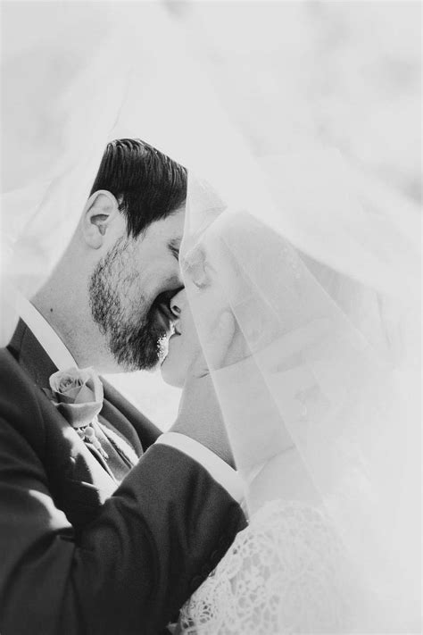 Wedding Bride And Groom Kissing Each Other Veil Image Free Photo