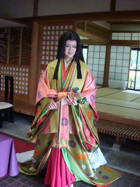 A Woman Dressed In Junihitoe At A Museum Dedicated To Murasaki Shikibu