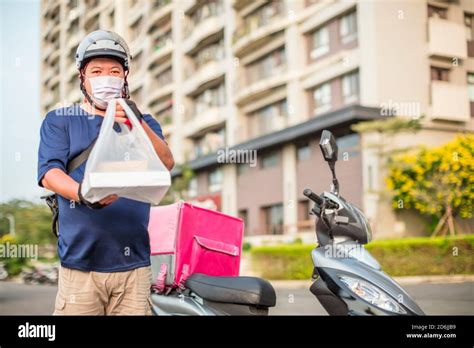 Food Delivery Staff Ride Motorcycles To Deliver Food Stock Photo Alamy