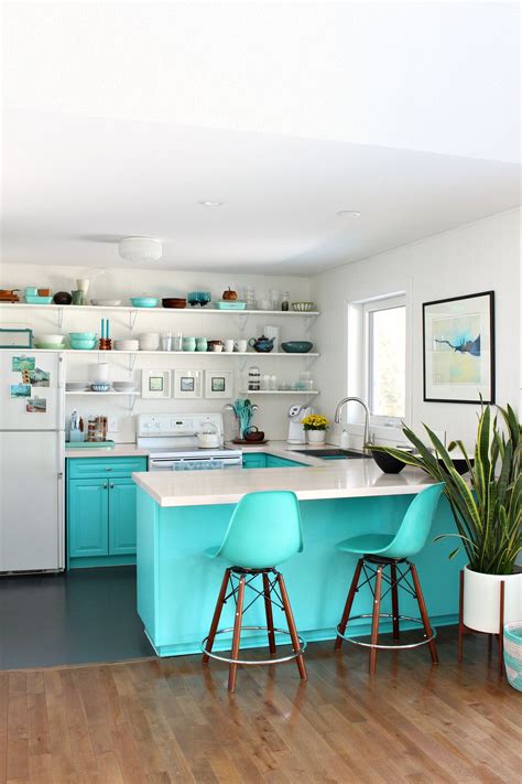 Turquoise Kitchen Cabinets And Open Shelving In Colorful Lake House