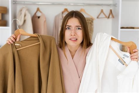 Free Photo Woman Having A Hard Time Deciding What To Wear