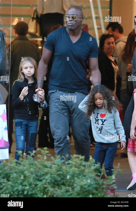 Seal And His Daughters Leni And Lou Leave The Apple Store At The Grove