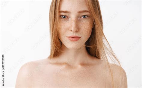 Close Up Shot Of Attractive Feminine Naked Redhead Woman With Freckles