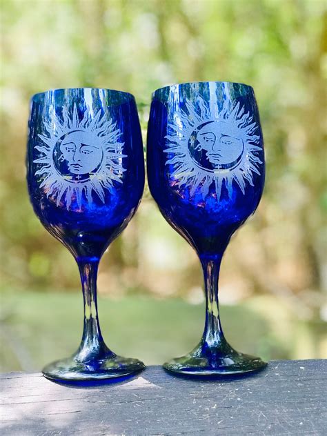 personalized engraved celestial cobalt blue stemmed wine glasses sun and moon engraved wine