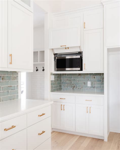 Hidden Microwave In Kitchen Cabinets White Modern Kitchen Gold