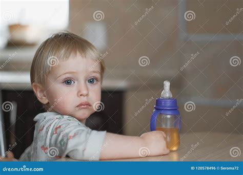 Cute Baby Drinking From A Bottle Stock Photo Image Of Care Newborn