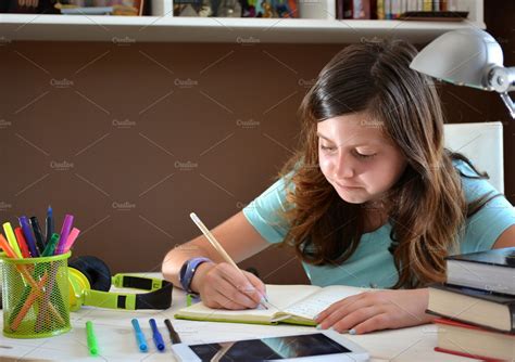 Girl Studying At Her Desk Stock Photo Containing School And Student