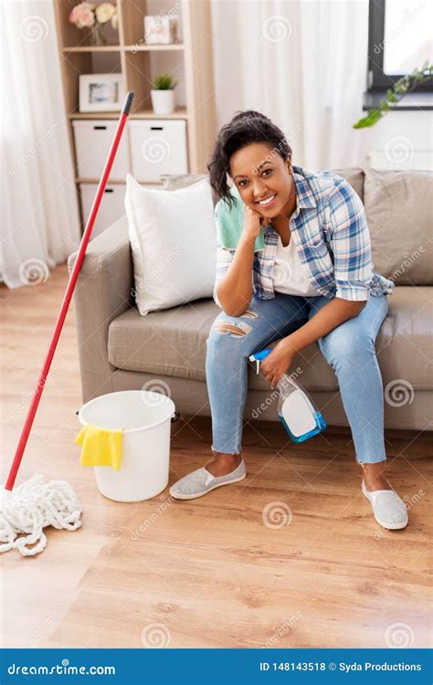 African Woman Or Housewife After Cleaning At Home Stock Photo Image