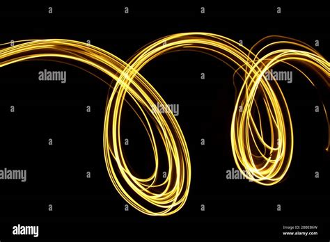 Long Exposure Photograph Of Vibrant Neon Color In An Abstract Swirl
