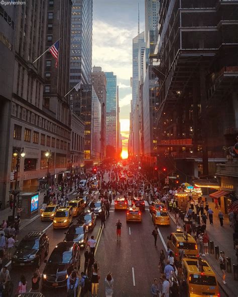 A Manhattanhenge Sunset Is Seen From Pershing Square Bridge On Park