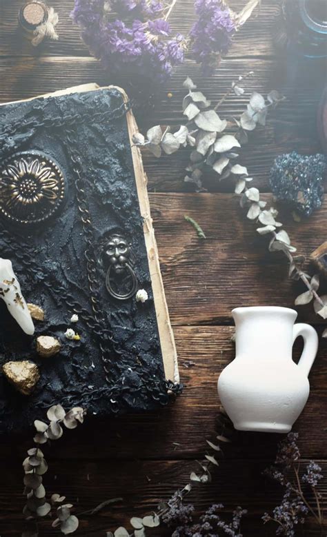 Download Mystical Grimoire In An Enchanted Library Wallpaper