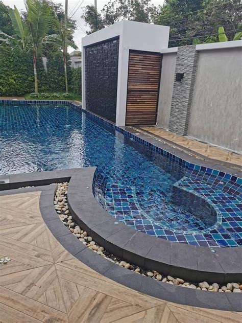 Swimming Pool With Mosaic Blue Glass Tiles