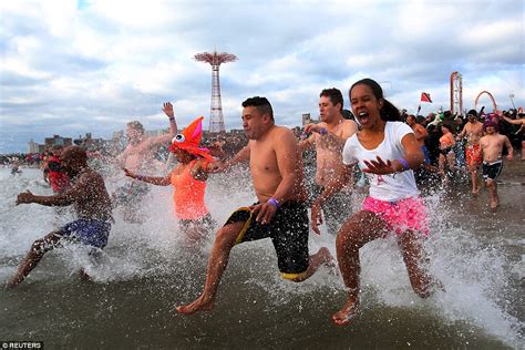 Thousands Ring In The New Year With Annual Polar Bear Plunge Daily