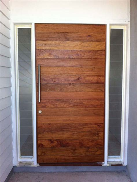 Teal wooden entry doors capture timber and glass at its best. Solid Timber Front and Entry Doors | Beachwood Doors