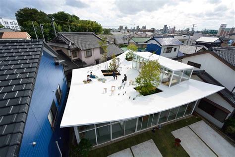 These Architects Gave Themselves Hangout Space On Their Curved Roof