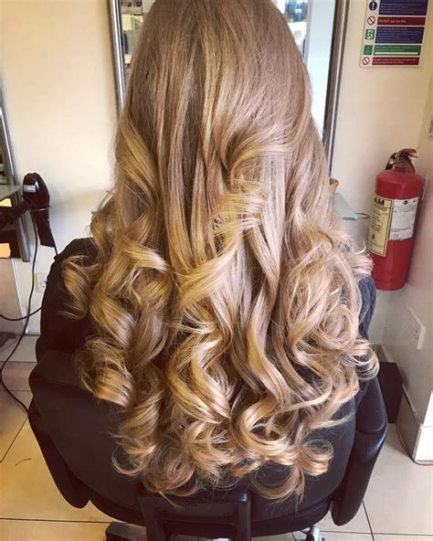 When you plop, you are wrapping your hair up in a specific way to draw some water from your hair before you air dry or diffuse. Gallery - Cabello Hair Design