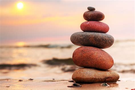 Stones Pyramid On Sand Symbolizing Zen Harmony Balance Online
