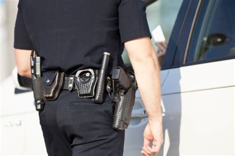 Police Officer Giving A Ticket Stock Photo Download Image Now Istock
