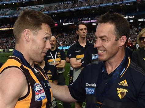 The hawks ran out onto the mcg on grand final day in 2008, with the banner saying: End of a Hawks era as Clarkson calls time | Illawarra Mercury | Wollongong, NSW