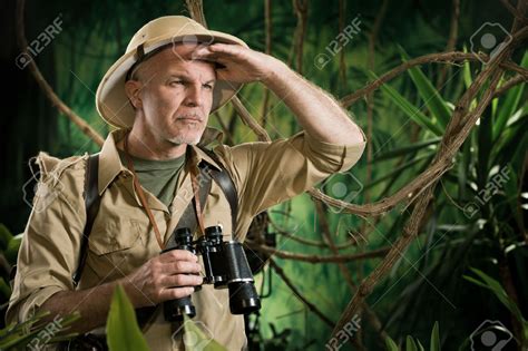 Image 31527991 Expert Explorer In The Forest Looking Away And Holding