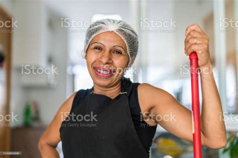 Portrait Of A Latin Woman House Cleaner At Home Latin Women Clean House Portrait