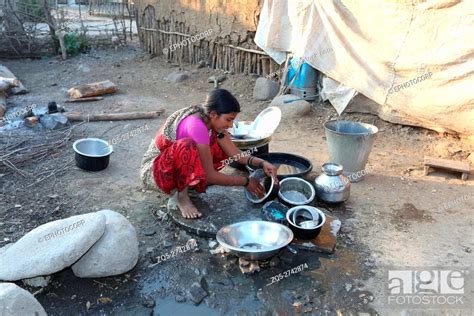 Tribal Woman Cleaning Utensils Pardhi Tribe Ganeshpur Village Post Wai District Yawatmal