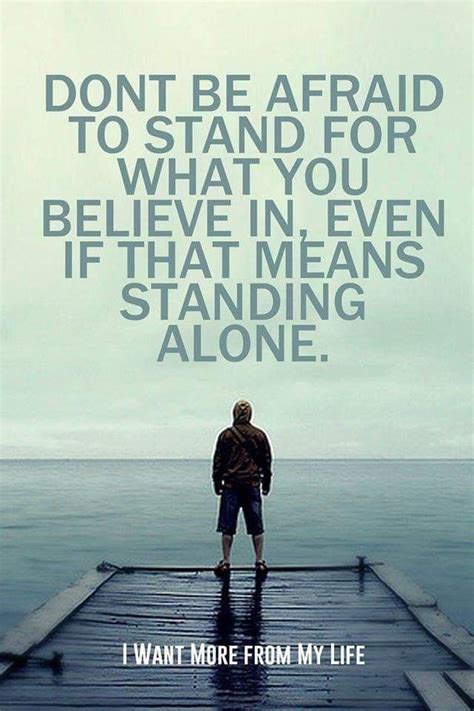 A Man Standing On Top Of A Pier Next To The Ocean With A Quote Above It