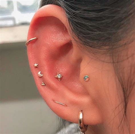 Ear Curation On Instagram Upper Helix Tragus Conch Triple Lobe Piercings And A Triple Mid