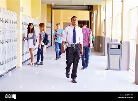 Students Walking In Hallway
