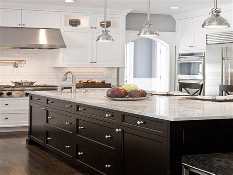 Get inspiration for a clean, crisp white kitchen with pictures and ideas from hgtv for cabinets, countertops, backsplashes and more. Black and White Kitchen Cabinets