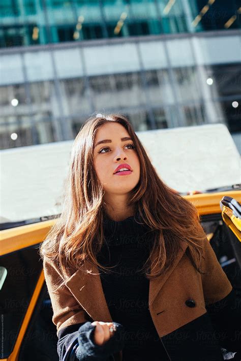 Beautiful Woman Taking A Taxi In New York City By Stocksy Contributor