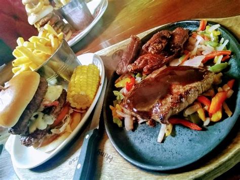 Farm tools hanging on the walls. The White Barn, Northwich - Restaurant Reviews, Phone ...
