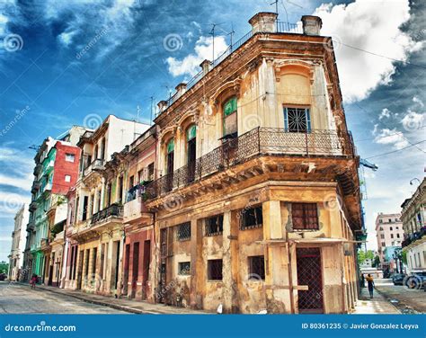 Old Havana Colonial Building With Balconies Against Blue Sky Stock