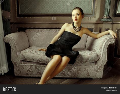 Beautiful Woman Sitting On Sofa Image And Photo Bigstock