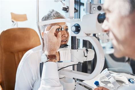 Senior Eye Exam Glaucoma Check And Medical Eyes Test Of Elderly Woman