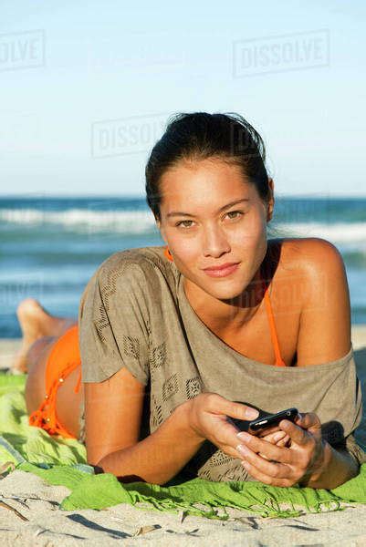 Babe Woman Relaxing On Beach Portrait Stock Photo Dissolve