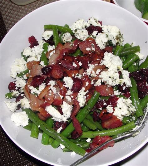 A Cranberries Green Bean And Bacon Salad Topped With Crumbled Goat